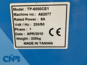 Foto van Omsnoeringsmachine